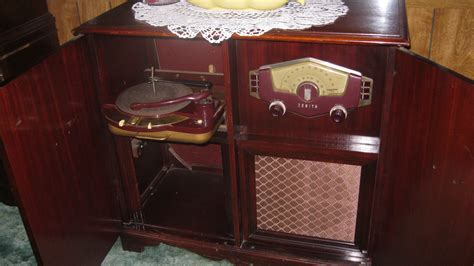 The <b>Cobramatic</b> record player has some oxidation on it. . Zenith cobramatic console